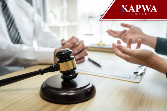 Gravel on table with an attorney and client